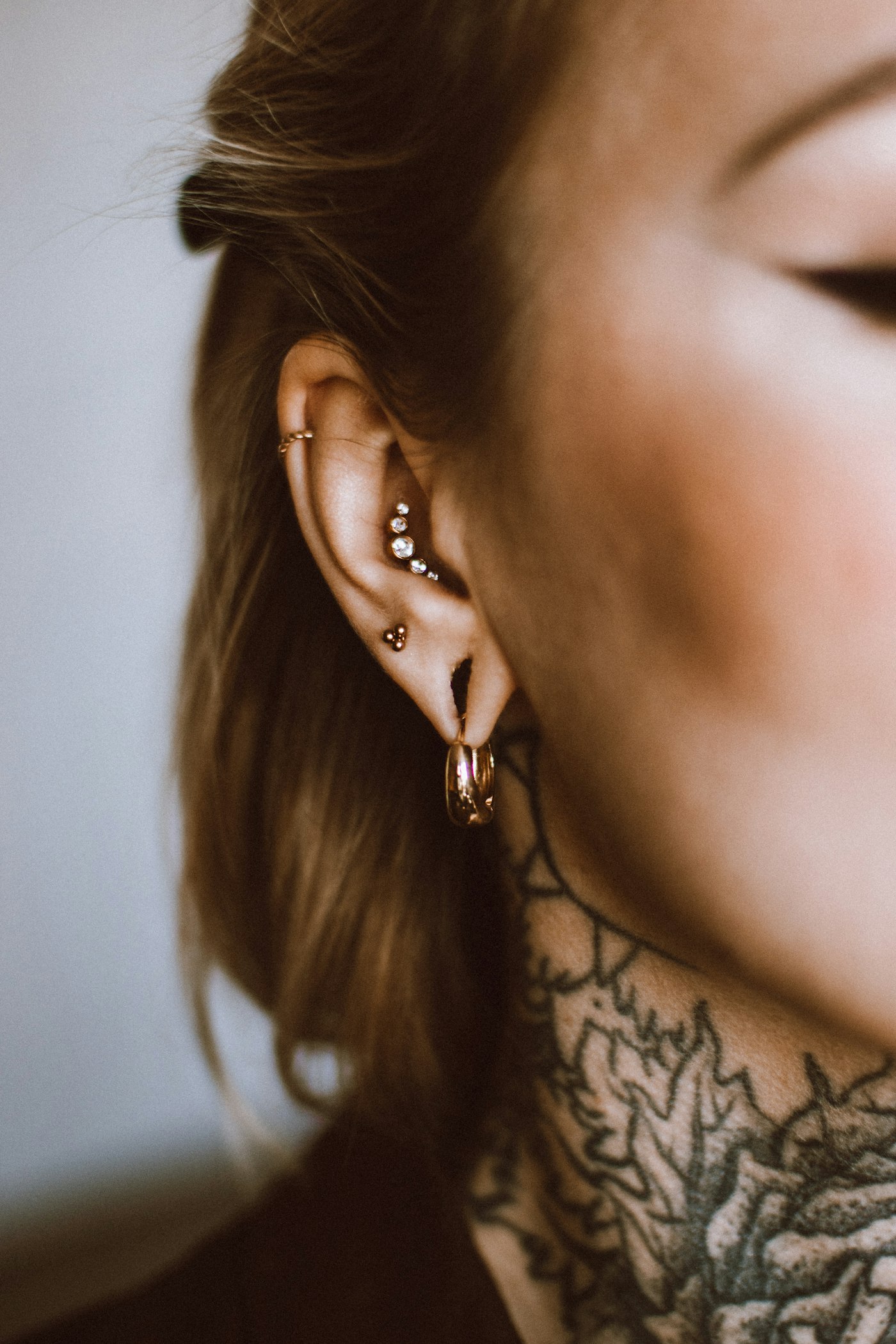 Body piercing with implant-grade jewelry